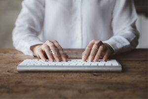 An image of a man typing in search on this How to Rank a Website on Search Engines An Easy to Understand Step-by-Step Guide