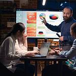 A picture of an employee analyzing data in this What is data-driven approach in digital marketing article.